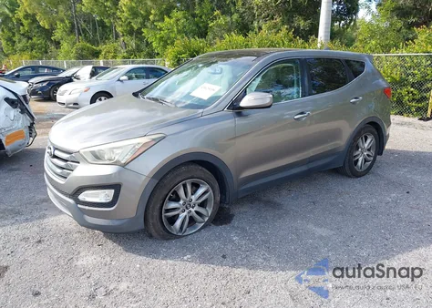 2013 Hyundai Santa Fe Sport 2.0T z USA, uszkodzony, nr VIN 5XYZW3LA0DG055382